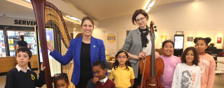 •	Veronica Lemishenko, harpist and Natalia Subbotina, cellist with students from Yamaha Music School 