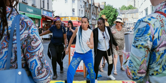 Female dancers on the street of London