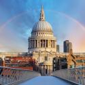 View of St Paul's Cathedral from a bridge with a rainbow over the dome